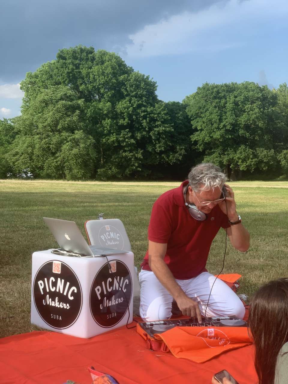 steven havin a picnic playing music in a park