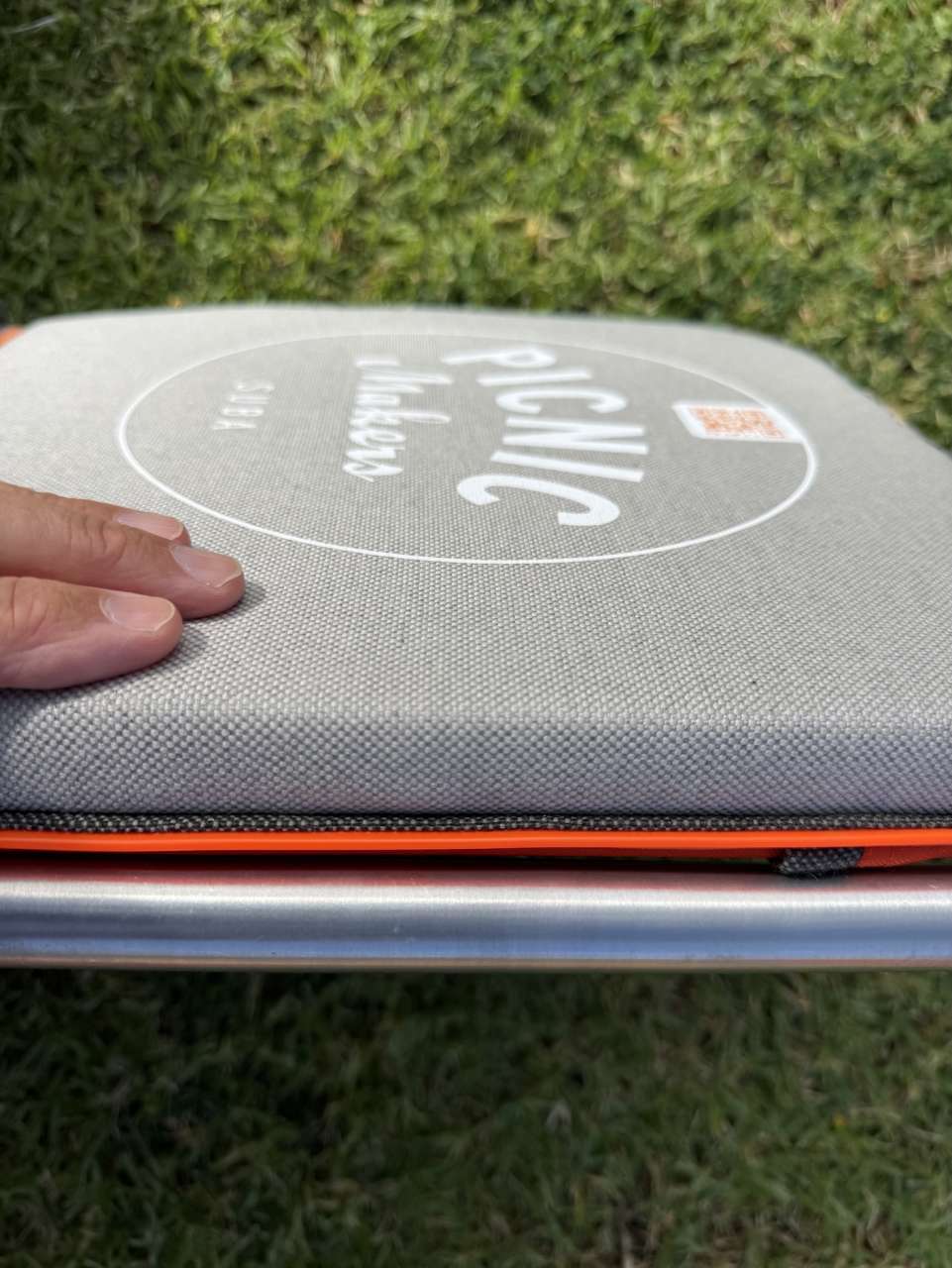 suba.backrest.silvergrey-folded-side-view-thick-padded-backrest-detail-sunlit-outdoor-setting